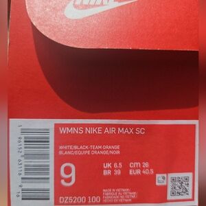 Nike Air Max SC Women's Shoes - White and Black with A Leopard Print Swoosh